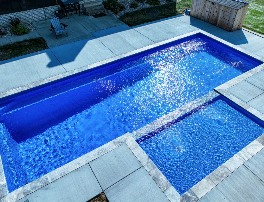 Aerial view of swimming pool with fountain