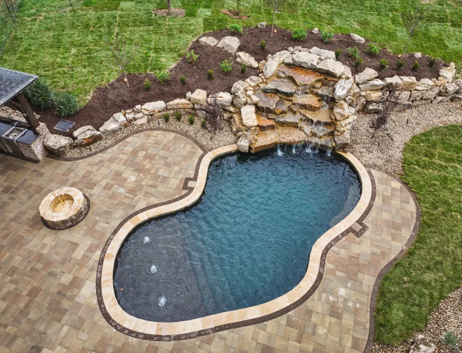 Aerial view of swimming pool with waterfall