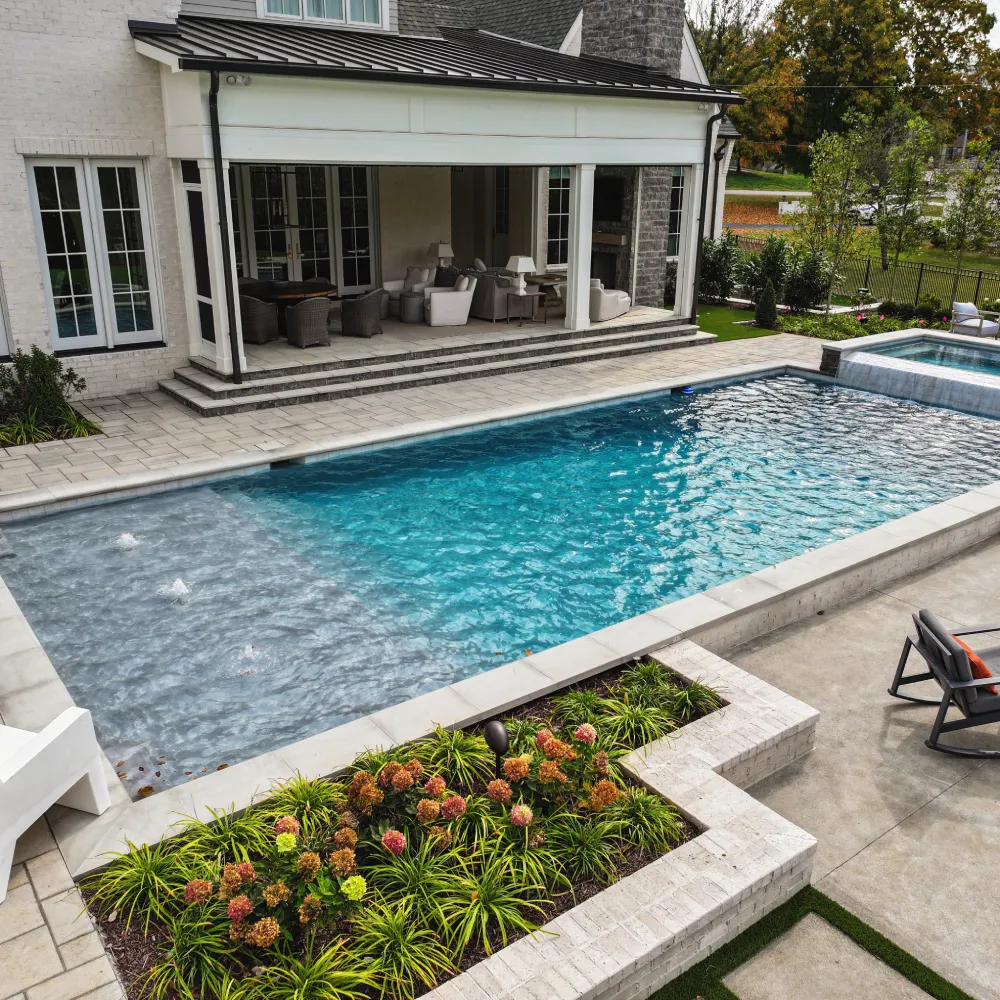 Rectangular pool with fountain and waterfall