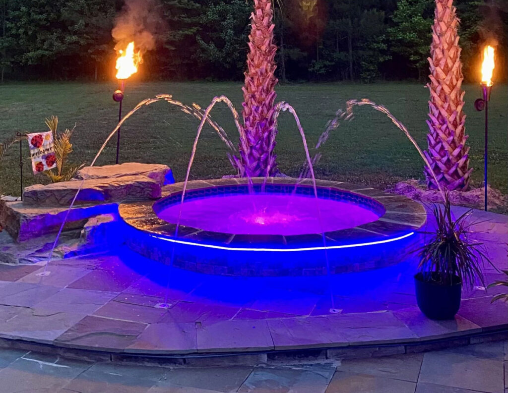A picture of a pool fountain