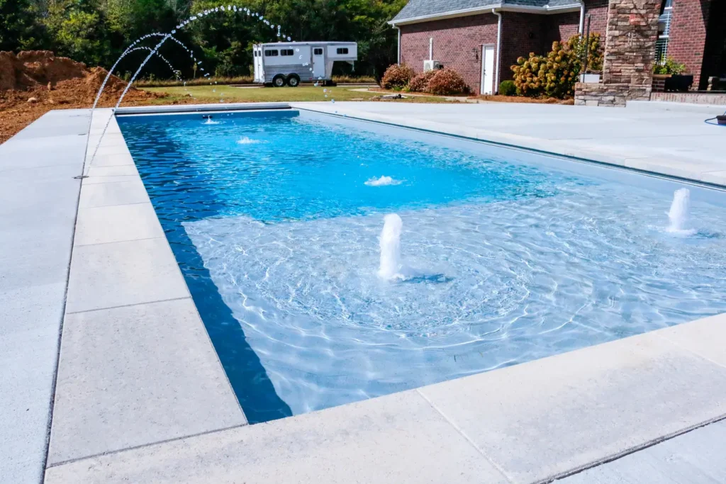 A pool with spouting water