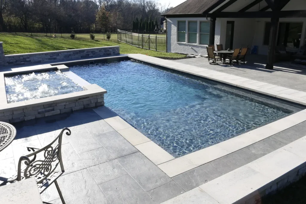 A picture of an outdoor backyard pool