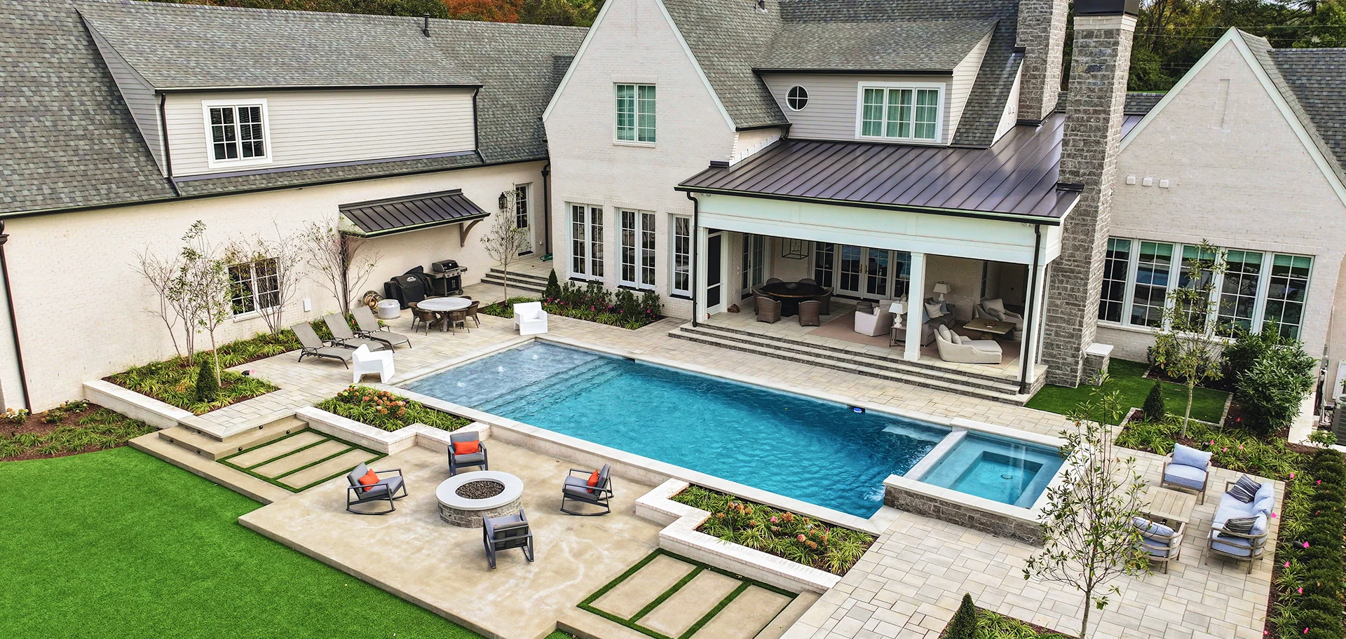A backyard rectangular fiberglass pool