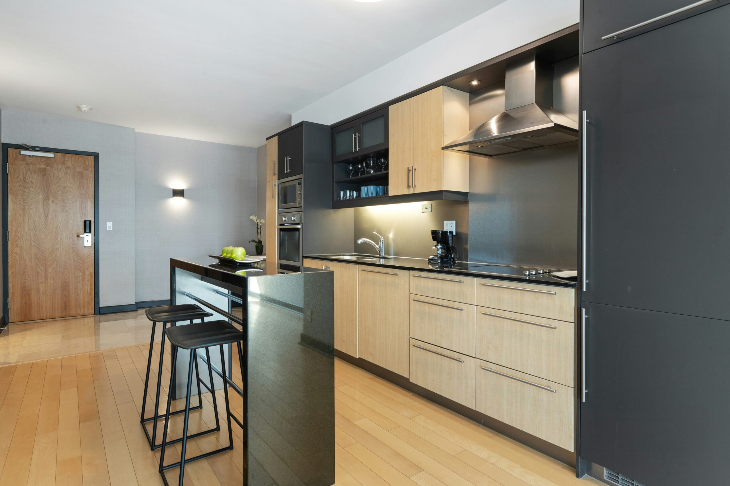 Newly finished kitchen interior, exemplifying interior spaces added or remodeled during a home addition project.