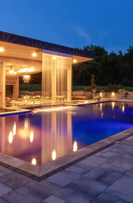 A custom fiberglass pool in Tennessee at dusk